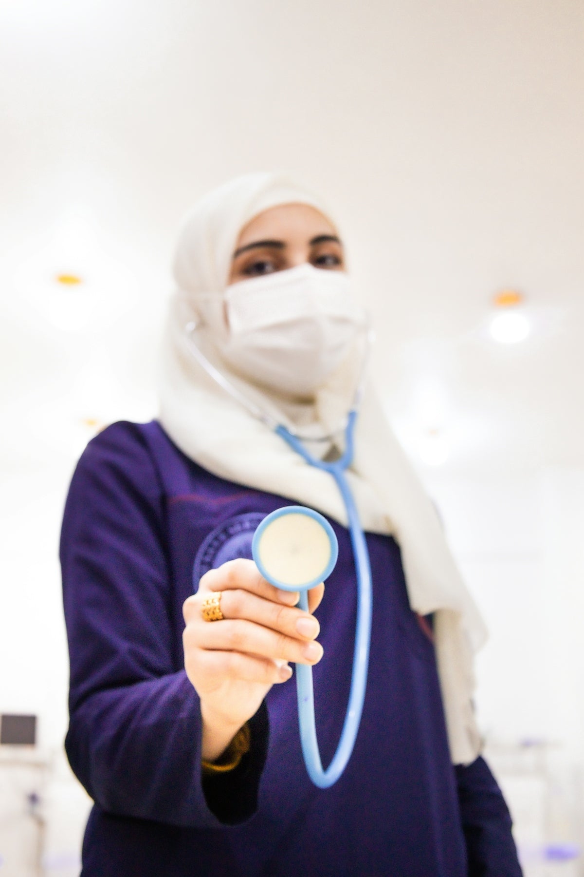 A healthcare professional with a stethoscope.